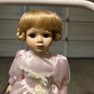 Pink Porcelain Doll with Blonde Hair